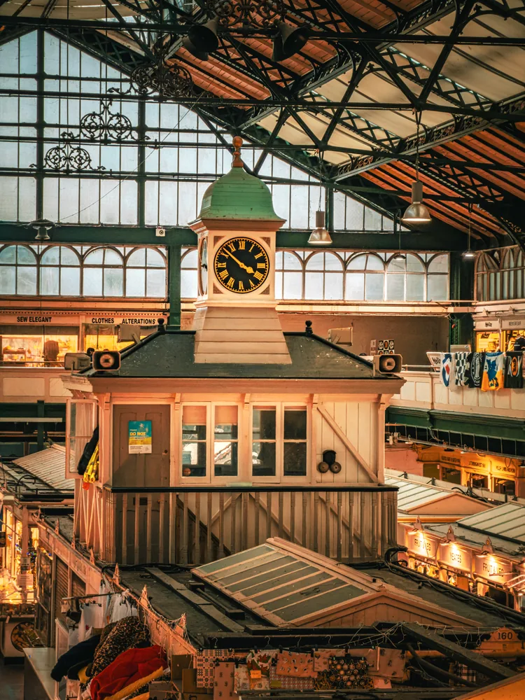 the cardiff market photograph looks up into the glazed roof and ironwork.